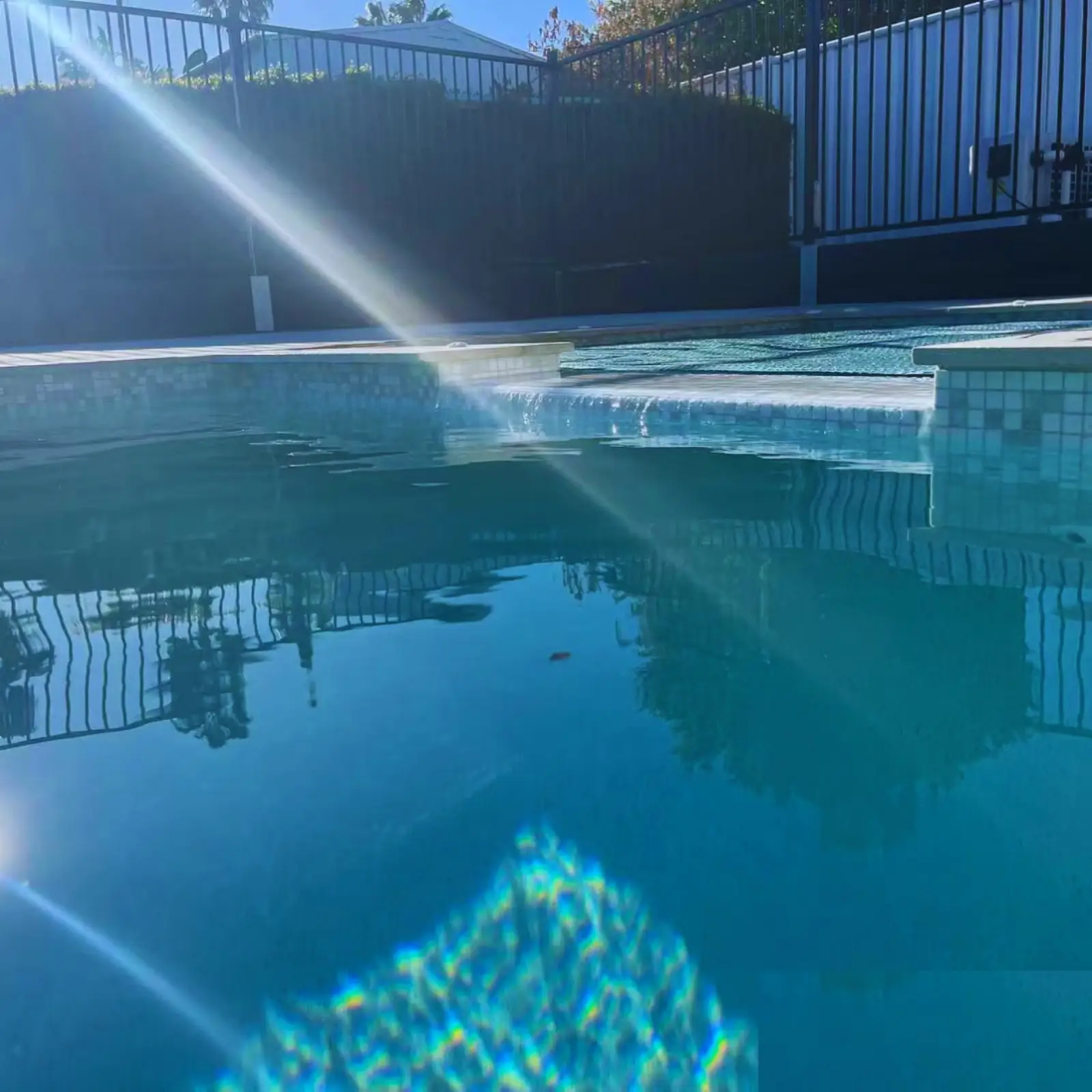 Newport · spa spillway · sunlit water